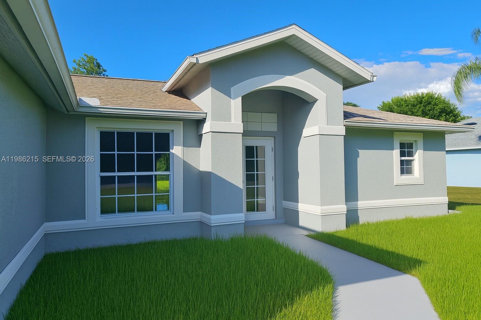 This is a digital rendering of the exterior of a gray single-story house — 116 ridgemont Dr, Lehigh Acres FL 33972, LEHIGH ACRES, FL