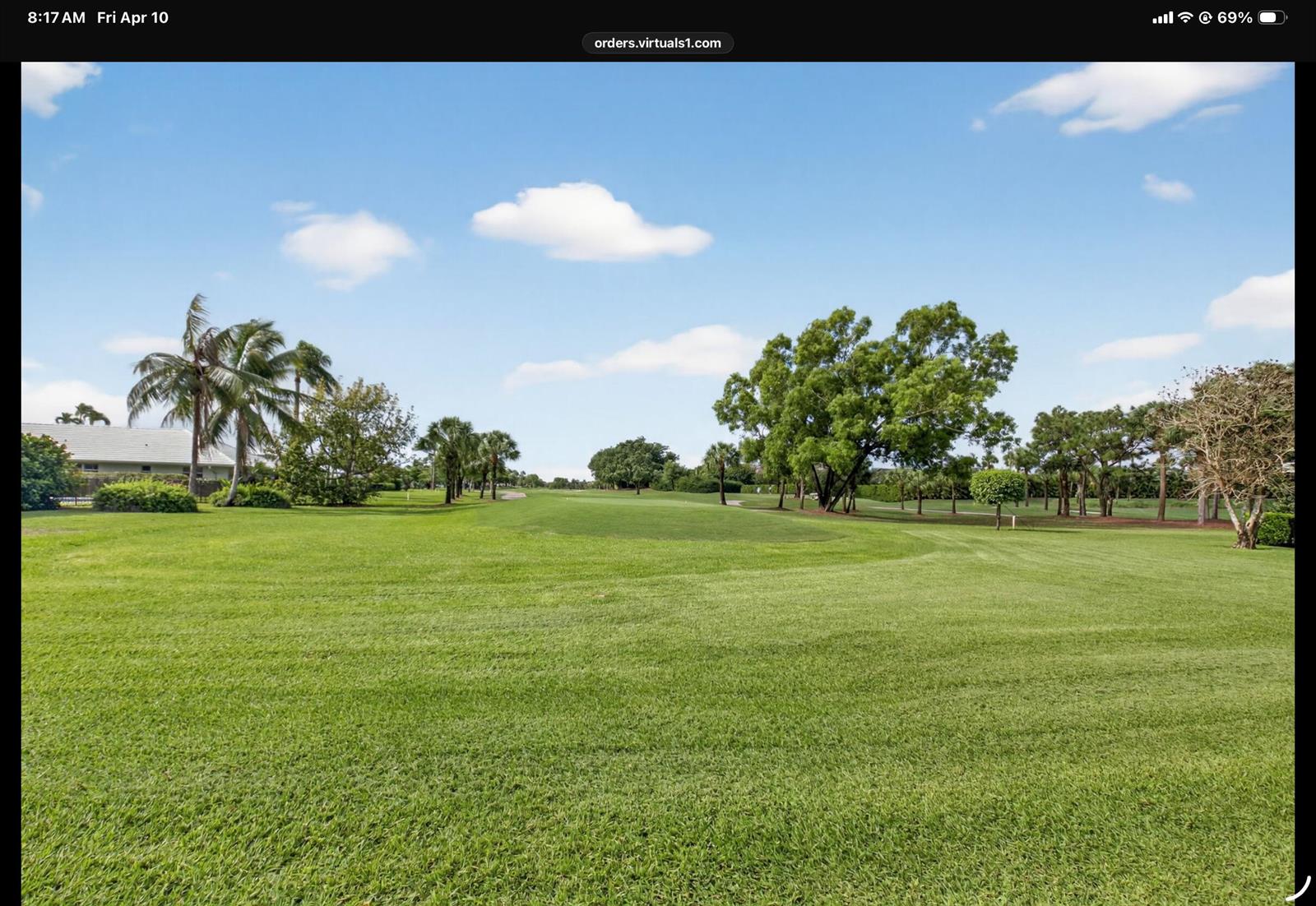 A wide, grassy golf course fairway is lined with various trees under a blue sky — 2 Holly Drive, Boynton Beach FL 33436, BOYNTON BEACH, FL