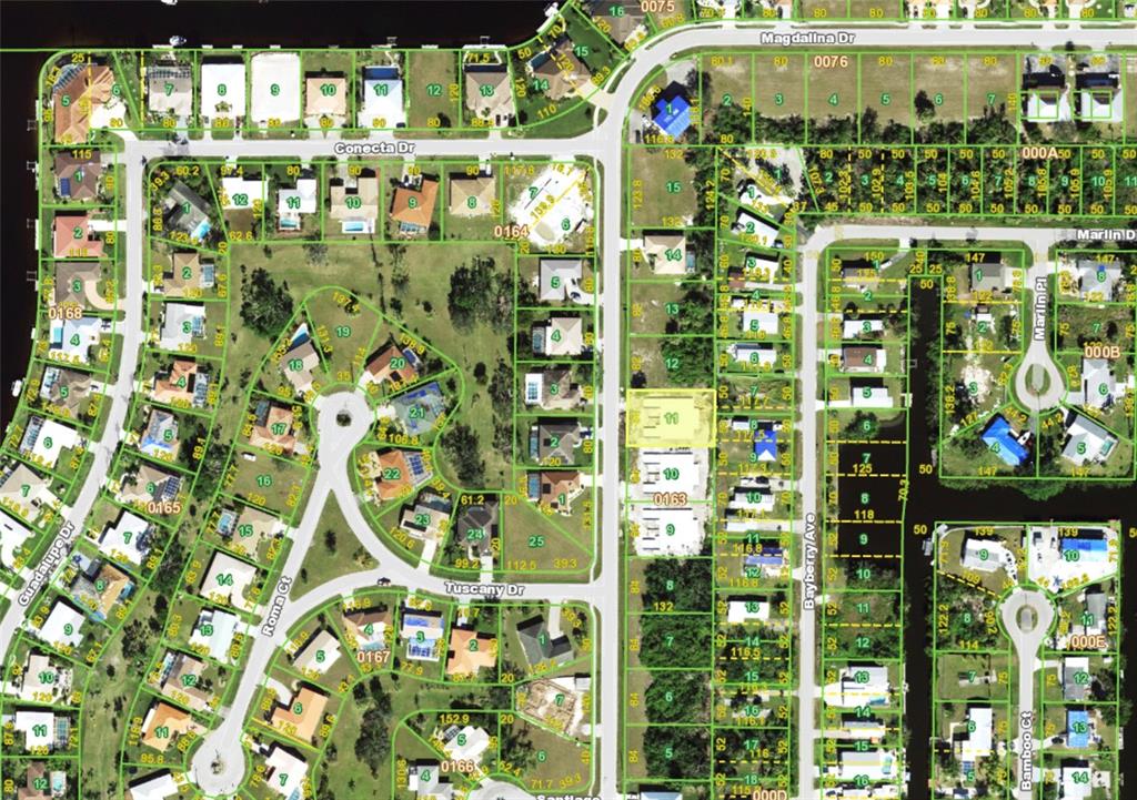 This is a satellite map view of a residential neighborhood with houses and streets — 2926 MAGDALINA DRIVE, PUNTA GORDA, FL