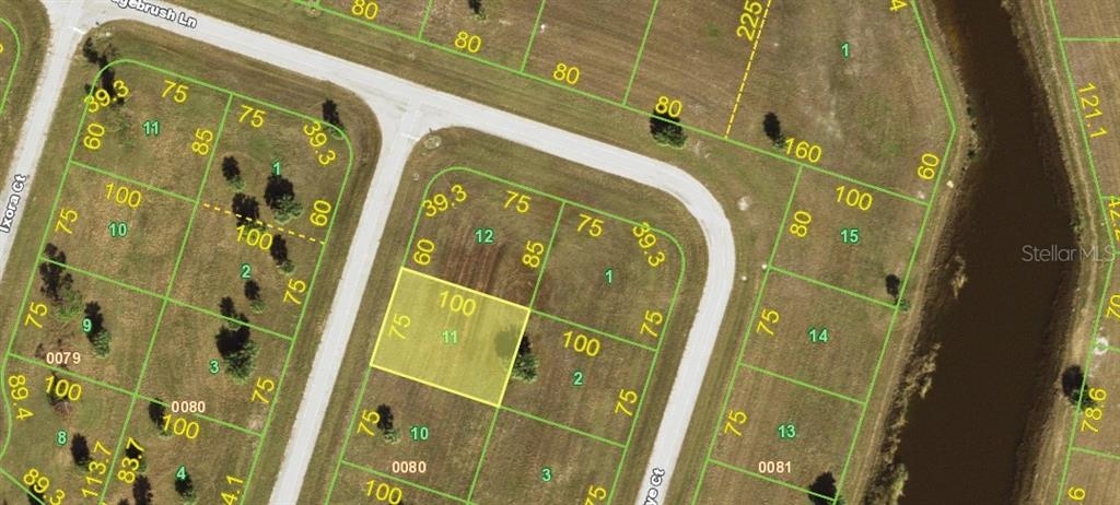 This is a satellite map showing a highlighted residential lot within a subdivision — 26 CASSIA COURT, PLACIDA, FL
