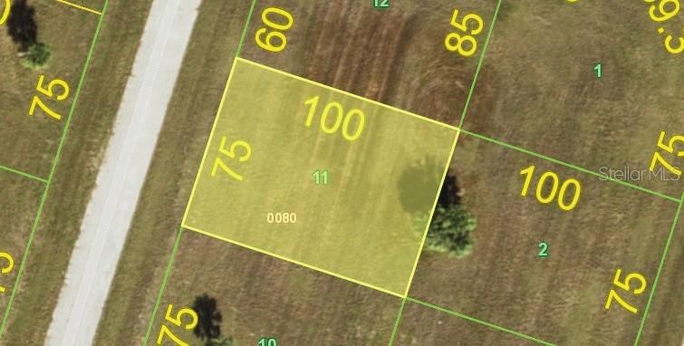 This is a map showing the property boundaries and dimensions of a vacant residential lot — 26 CASSIA COURT, PLACIDA, FL