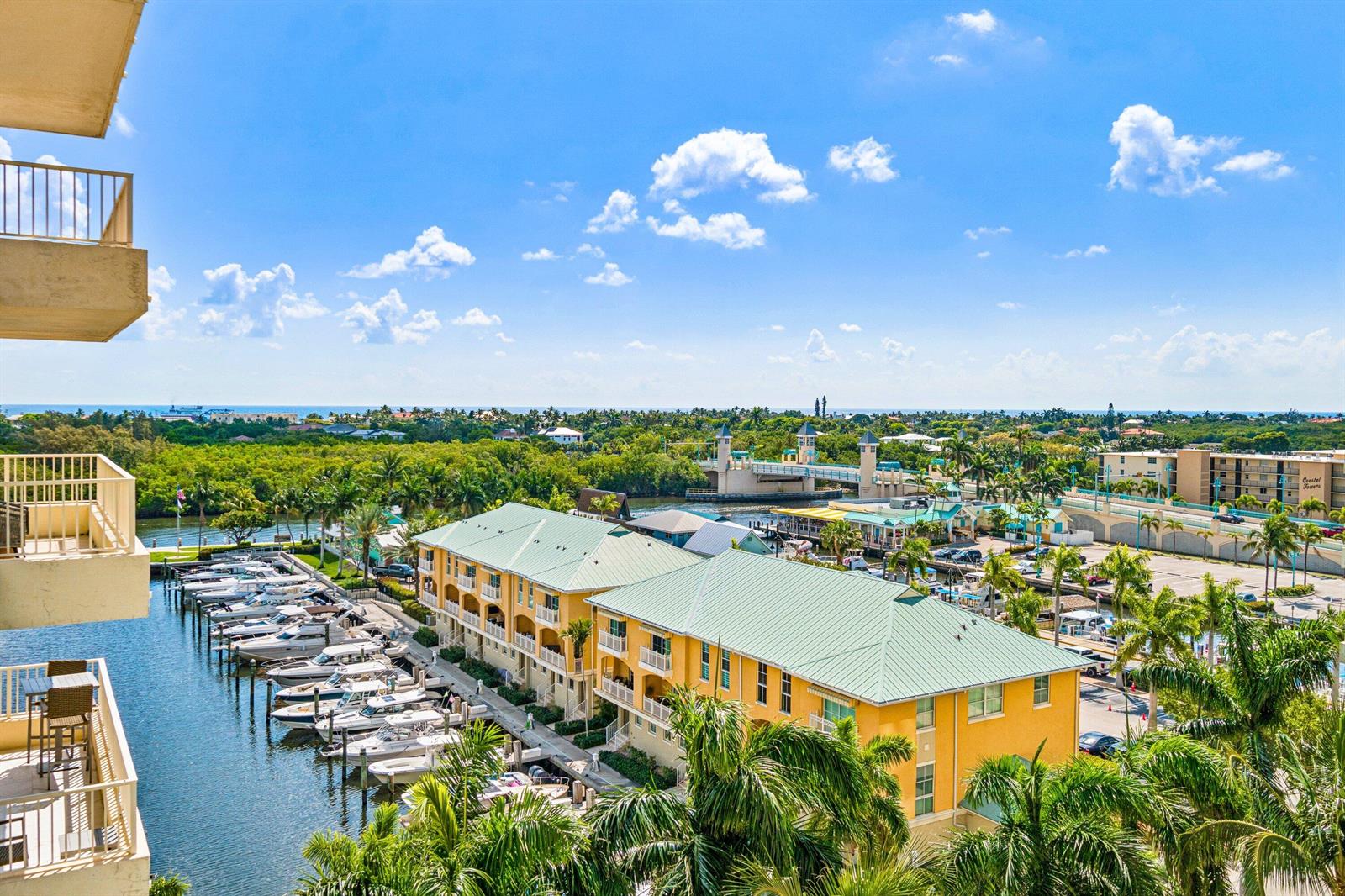 An aerial view of a rectangular swimming pool surrounded by palm trees and lounge chairs — 700 E Boynton Beach Boulevard # 803, Boynton Beach FL 33435, BOYNTON BEACH, FL