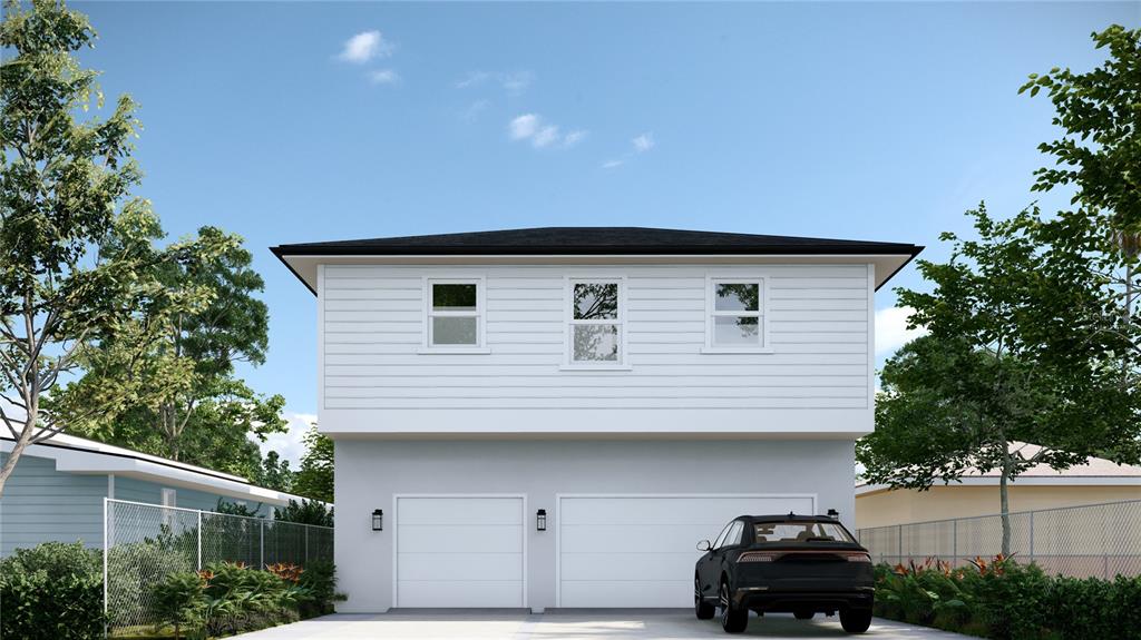 This is a rendering of a two-story house exterior with a two-car garage — 5032 20TH AVENUE N UNIT 1, ST PETERSBURG, FL