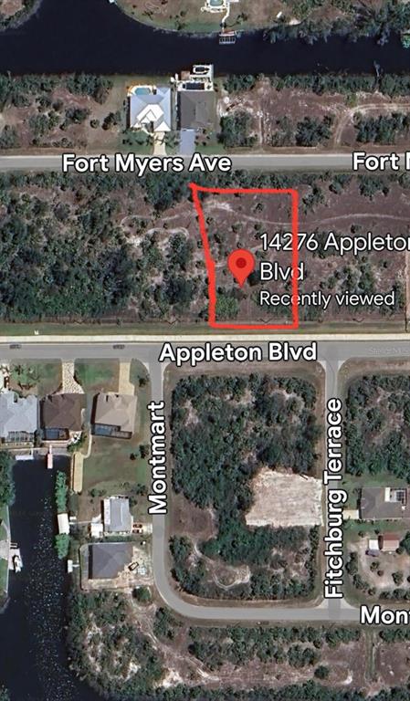 This is an aerial map view of a vacant residential lot outlined in red — 14276 APPLETON BOULEVARD, PORT CHARLOTTE, FL