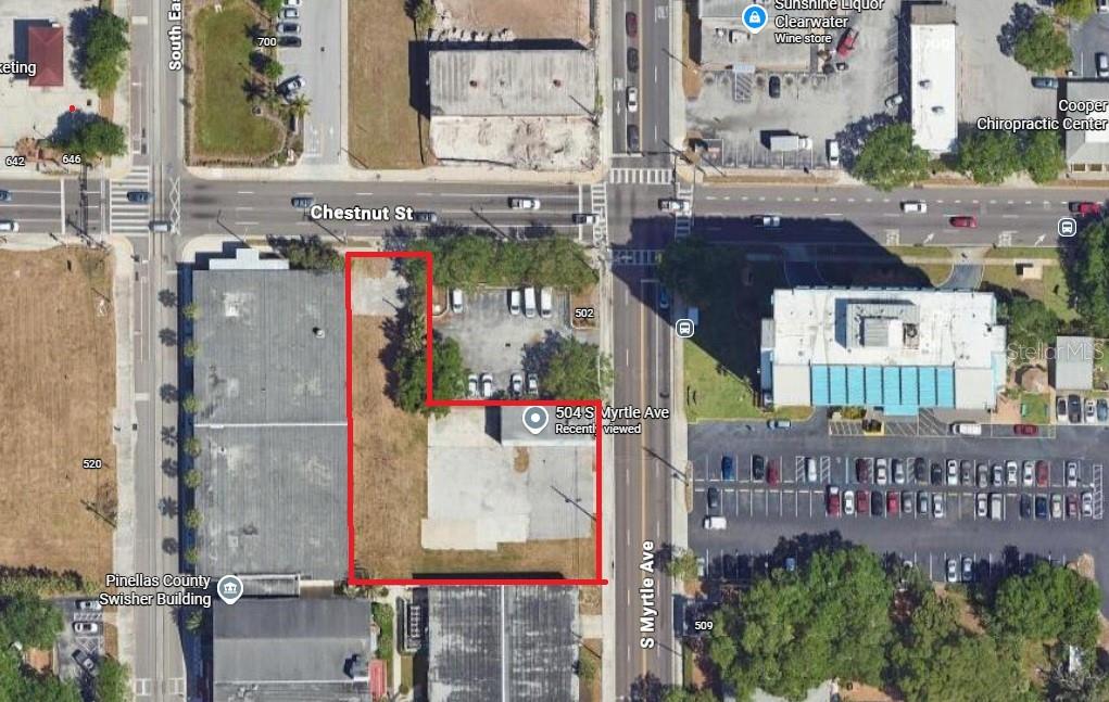 An aerial map view shows a vacant commercial lot outlined in red on a city corner — 504 S MYRTLE AVENUE, CLEARWATER, FL