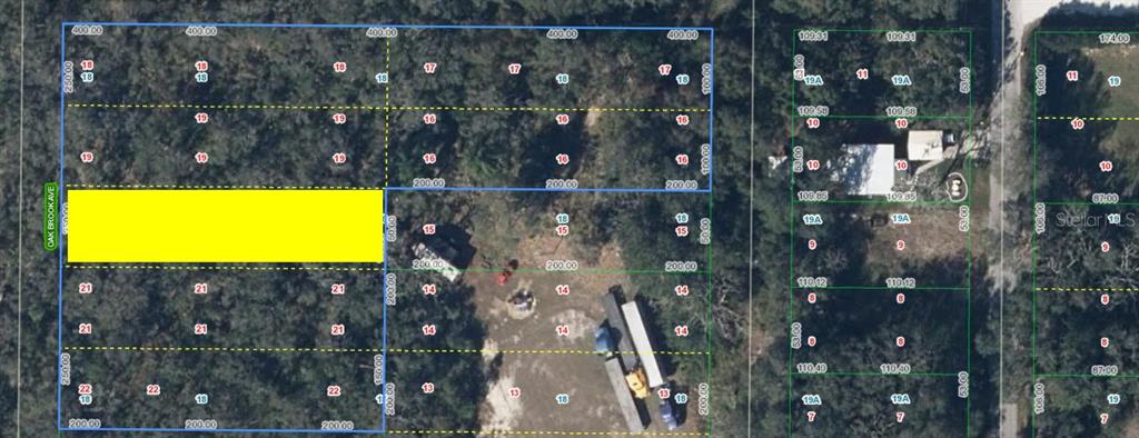 This is a satellite map showing property lot lines and parcel numbers for a wooded area — 6101 OAK RIDGE AVENUE LOT 20, SEBRING, FL