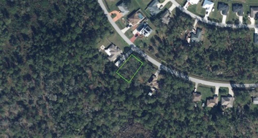 An aerial map view shows a vacant, rectangular lot outlined in green within a wooded neighborhood — 5211 LAKE HAVEN BOULEVARD, SEBRING, FL