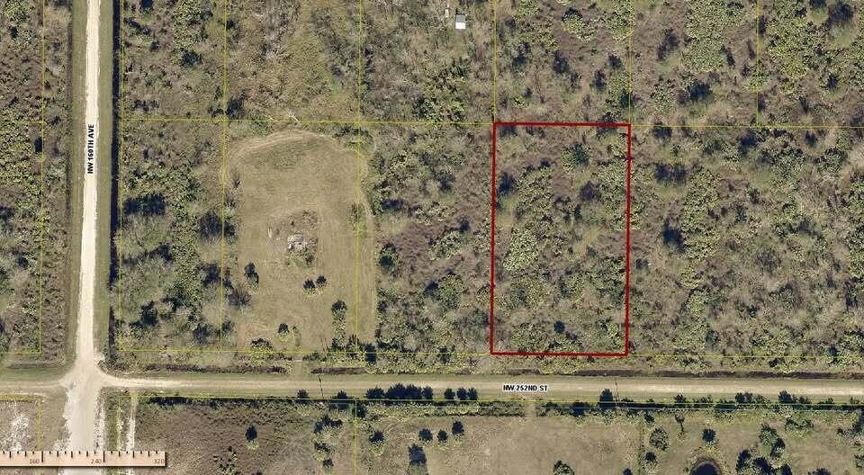 An aerial map shows a rectangular vacant lot outlined in red near a dirt road — 15839 NW 252nd Street, Okeechobee FL 34972, OKEECHOBEE, FL