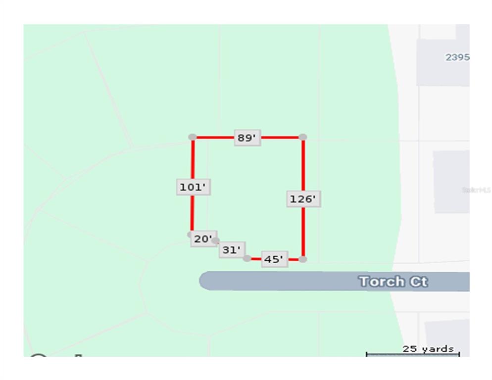 This is a map showing the property lines and dimensions of a residential lot — TORCH COURT, NORTH PORT, FL