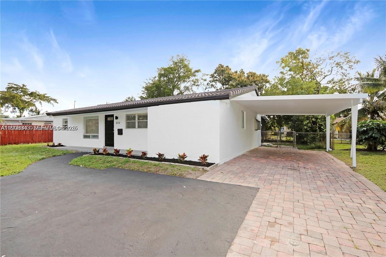 610 NW 38th Ct, Deerfield Beach FL 33064