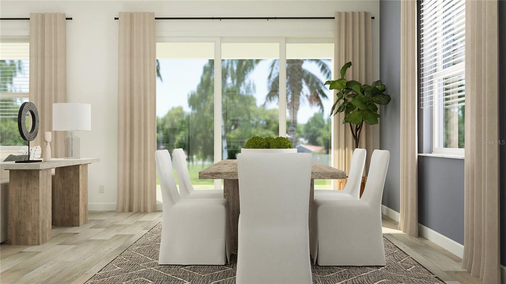 This rendering shows a dining room with a wooden table, white chairs, and sliding glass doors — 9091 MINNOW RAY DRIVE, LAND O LAKES, FL