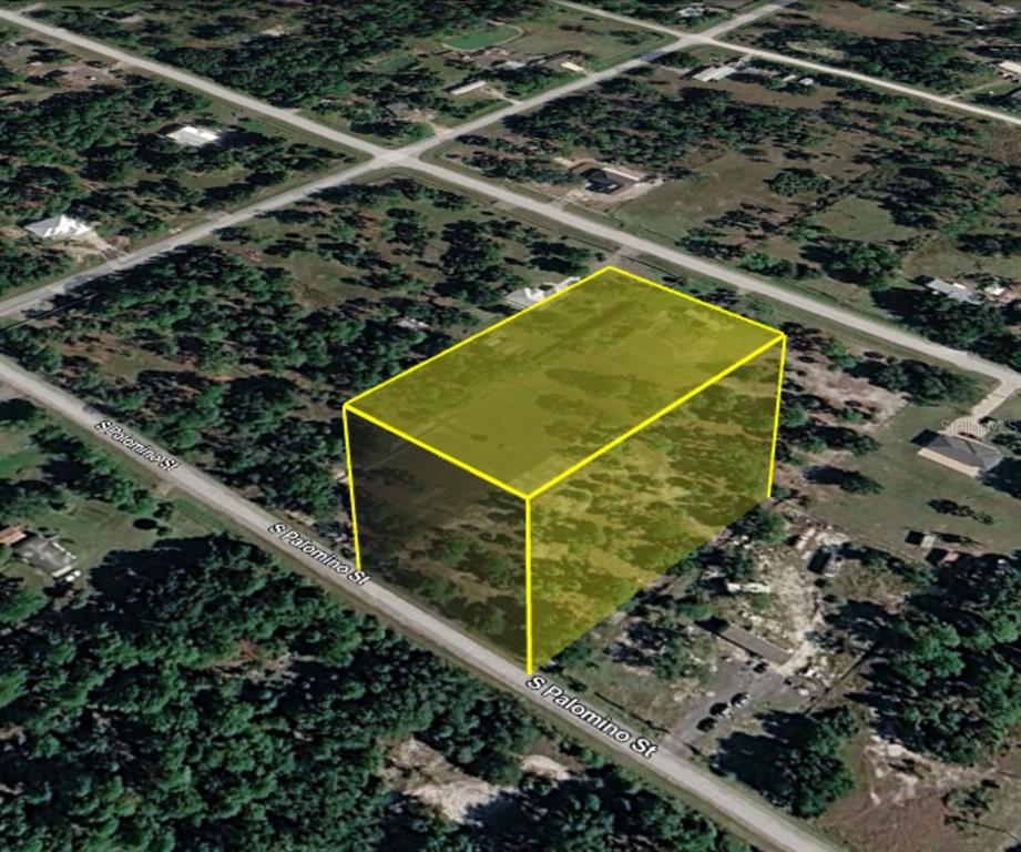 An aerial view shows a vacant, rectangular plot of land highlighted in yellow — 345 S PALOMINO STREET, CLEWISTON, FL