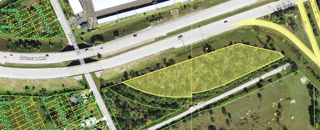An aerial map view shows a highlighted vacant lot situated near a highway overpass — Unnamed US17 I75 EXIT 164 STREET, PUNTA GORDA, FL