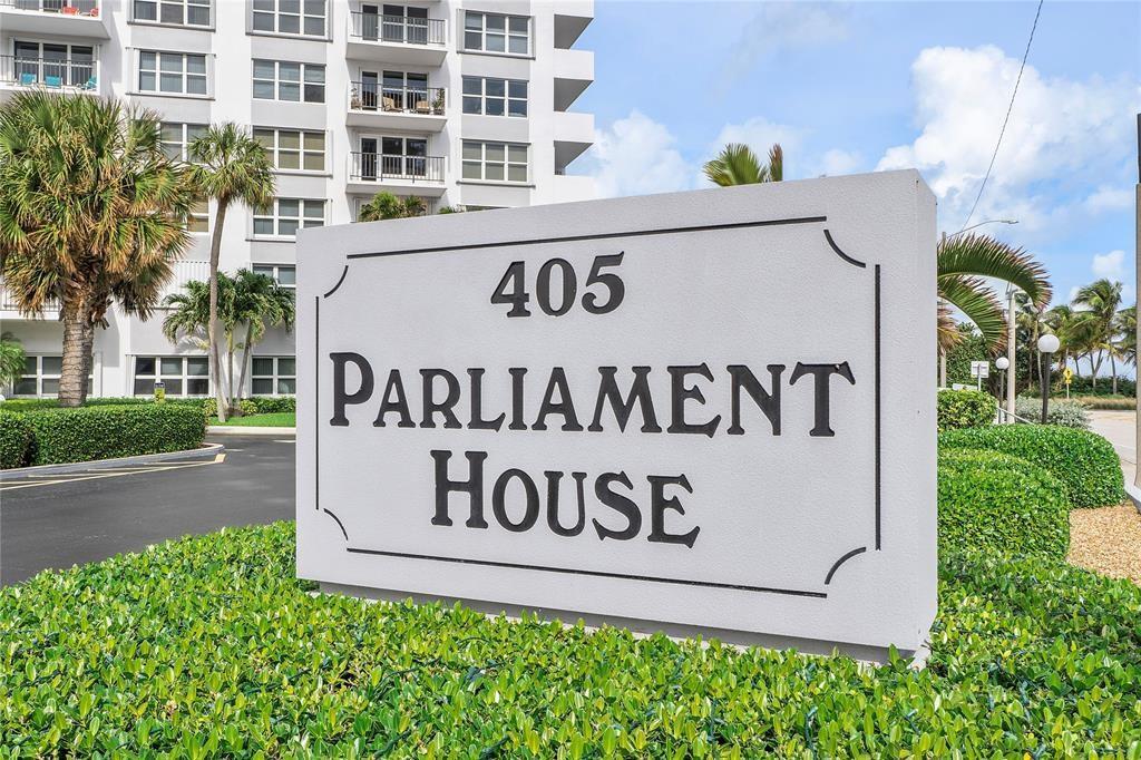A white sign for Parliament House stands in front of a multi-story residential building — 405 N Ocean Boulevard, Pompano Beach FL 33062, POMPANO BEACH, FL
