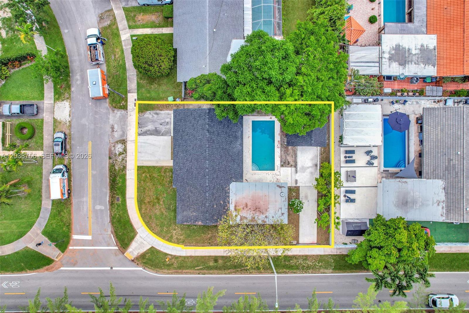 This aerial view shows a residential property with a house, swimming pool, and yard — 8201 SW 42nd St, Miami FL 33155, MIAMI, FL