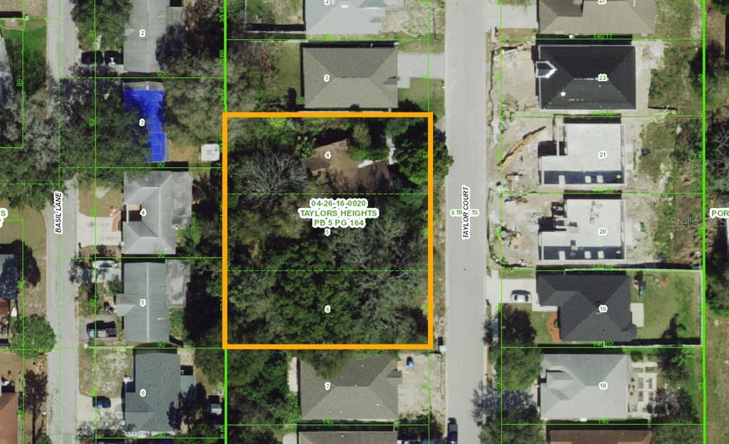 This is an aerial map showing a rectangular residential lot outlined in orange — 6515 TAYLOR COURT, NEW PORT RICHEY, FL