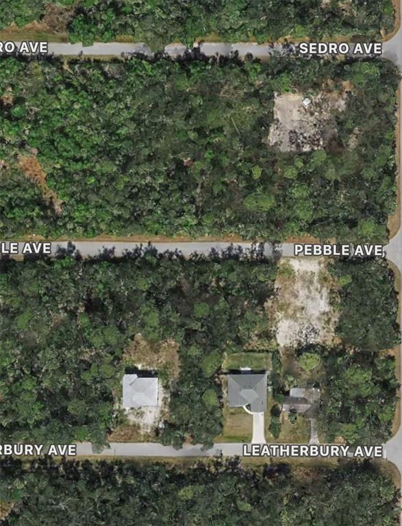 This aerial map shows several residential lots with some cleared land and existing houses — 13382 PEBBLE AVENUE, PORT CHARLOTTE, FL