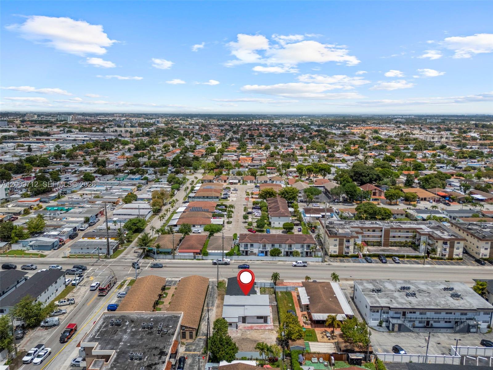 An aerial view shows a single-story building with a red location pin on a busy street — 1368 W 29th St # 2, Hialeah FL 33012, HIALEAH, FL