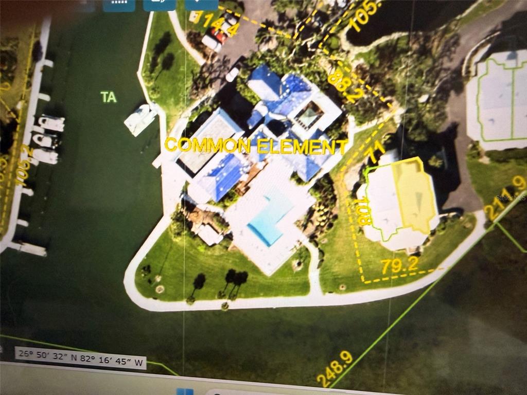 This is an aerial map showing a building footprint, surrounding grounds, and property boundary measurements — 11000 PLACIDA ROAD UNIT 101, PLACIDA, FL