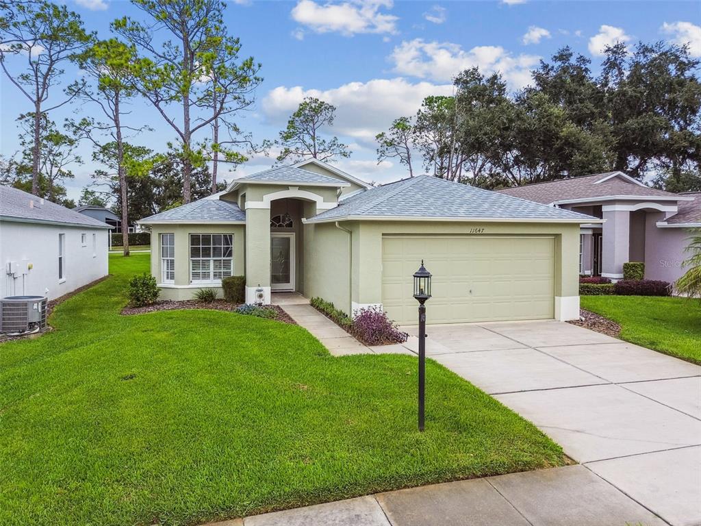 11647 WHEATFIELD LOOP, HUDSON, FL — photo 3 of 30