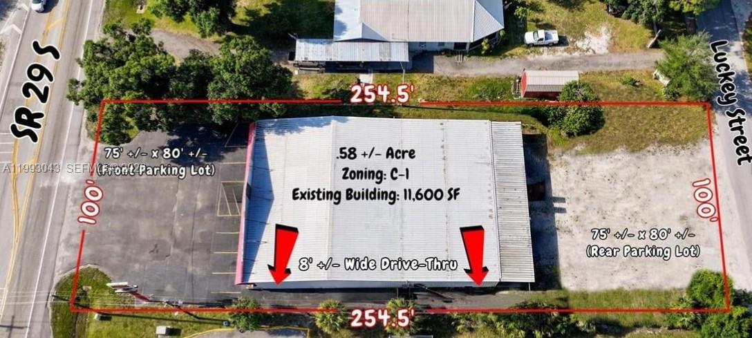 An aerial map shows a commercial property with a building, parking lots, and drive-thru access — 1060 SR 29 S, La Belle FL 33935, LA BELLE, FL