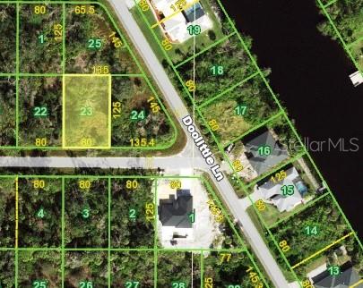 This is a satellite map showing a vacant lot highlighted in yellow among residential properties — 14512 GROTHAUS AVENUE, PORT CHARLOTTE, FL