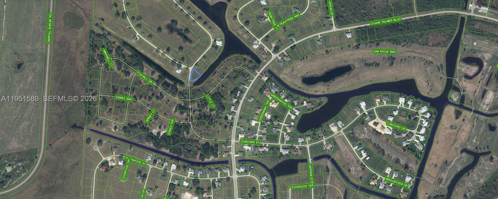 This is an aerial map showing residential streets, lots, and bodies of water — 1544 Blue Heron Drive, Sebring FL 33876, SEBRING, FL