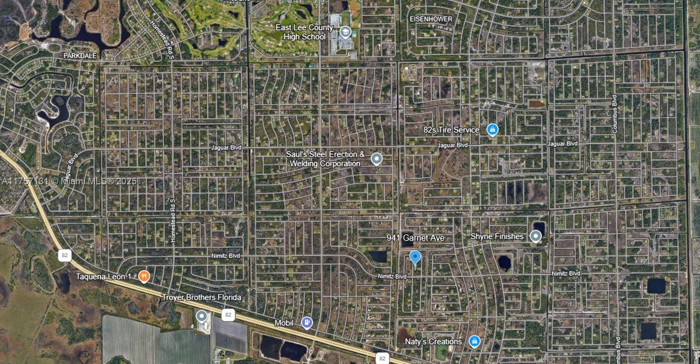 This is a satellite map view of a residential neighborhood in Lehigh Acres, Florida — 941 Garnet Ave, Lehigh Acres FL 33974, LEHIGH ACRES, FL