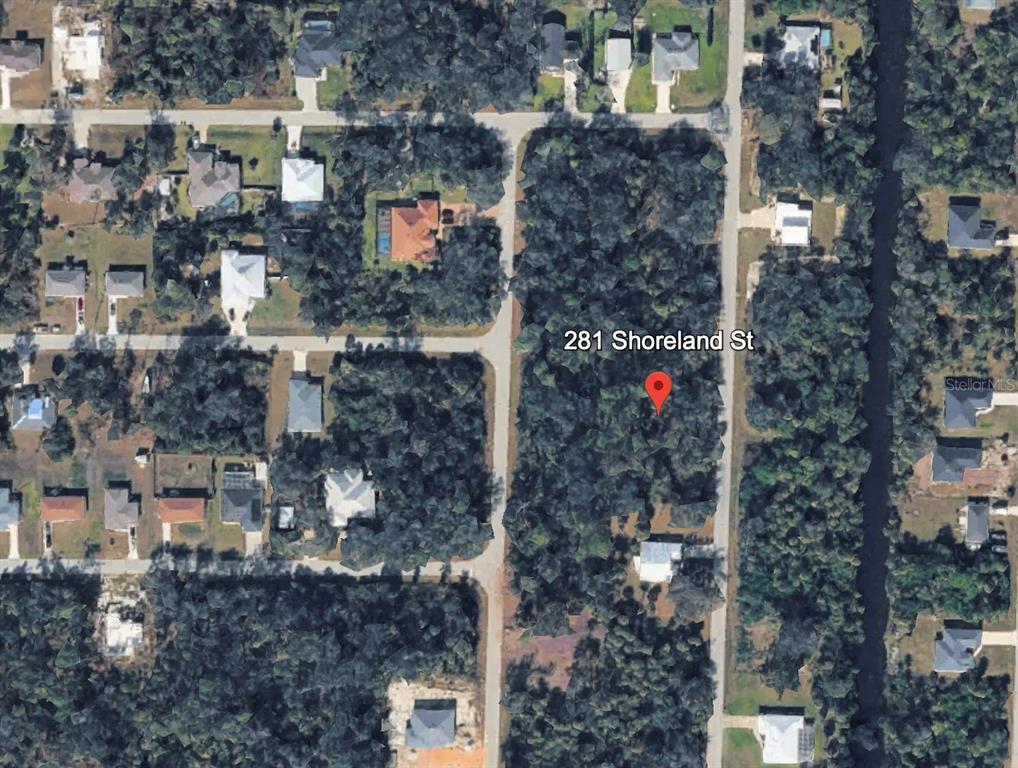This is an aerial map view of a wooded residential lot — 281 SHORELAND STREET, PORT CHARLOTTE, FL