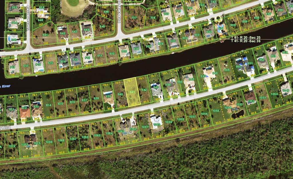 This is an aerial map showing residential lots along a canal and streets — 1162 BOUNDARY BOULEVARD, ROTONDA WEST, FL