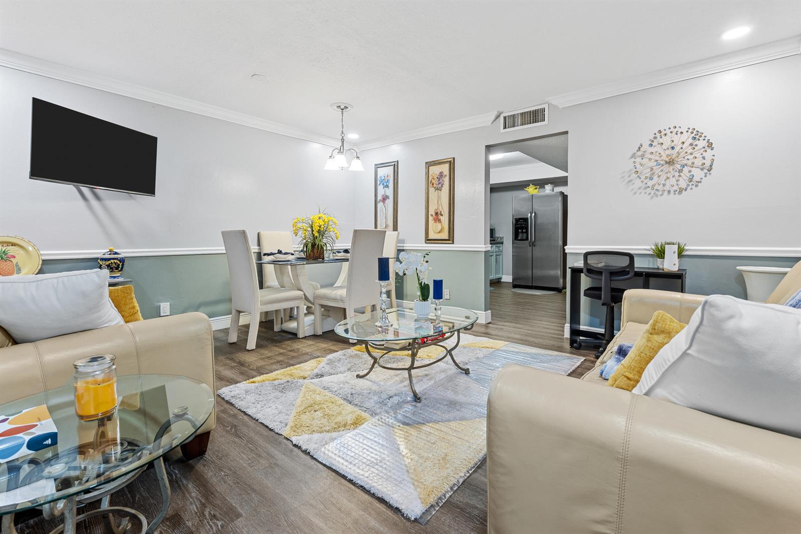 A living room and dining area feature light-colored furniture, a glass coffee table, and flooring — 101 NE 4th Street # 3, Delray Beach FL 33444, DELRAY BEACH, FL