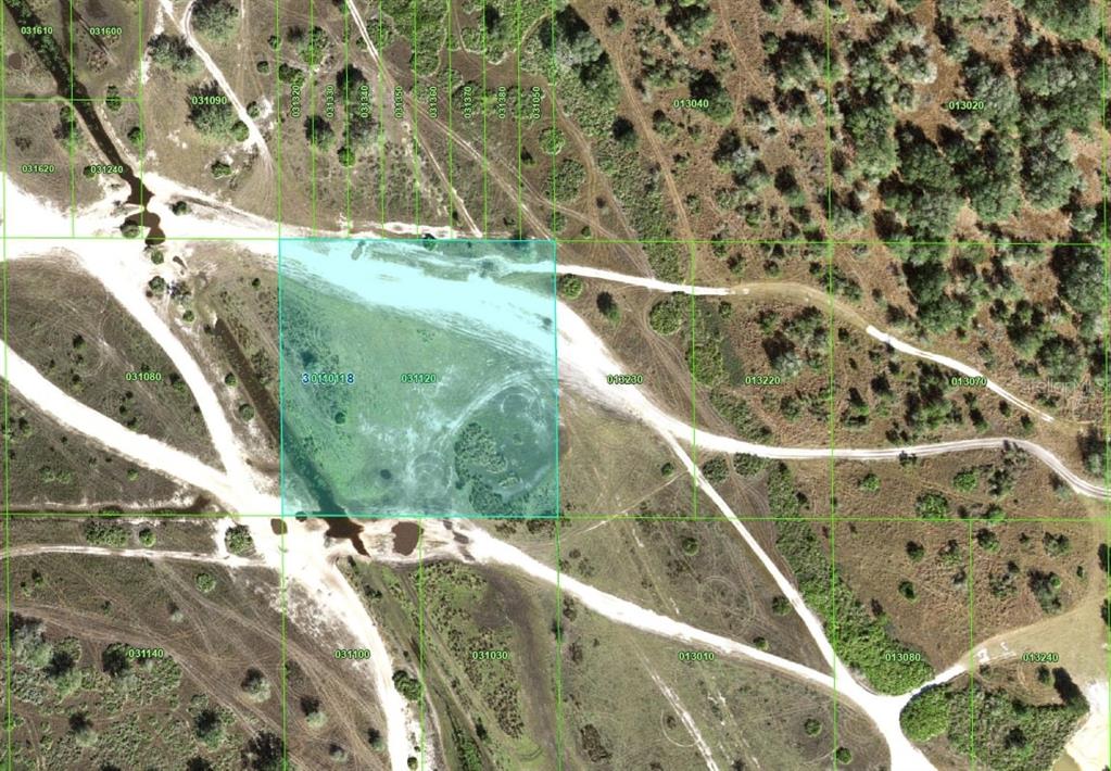 This is an aerial map showing a highlighted land parcel surrounded by dirt roads and vegetation — HWY 630, FROSTPROOF, FL