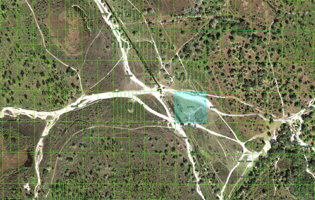 This is a satellite map view showing a highlighted land parcel with surrounding dirt roads — HWY 630, FROSTPROOF, FL