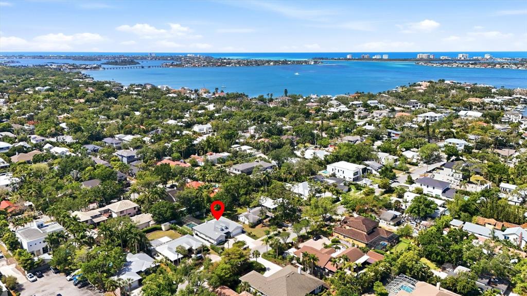 An aerial view shows a residential neighborhood with a red pin marking a specific house — 1714 WALDEMERE STREET, SARASOTA, FL