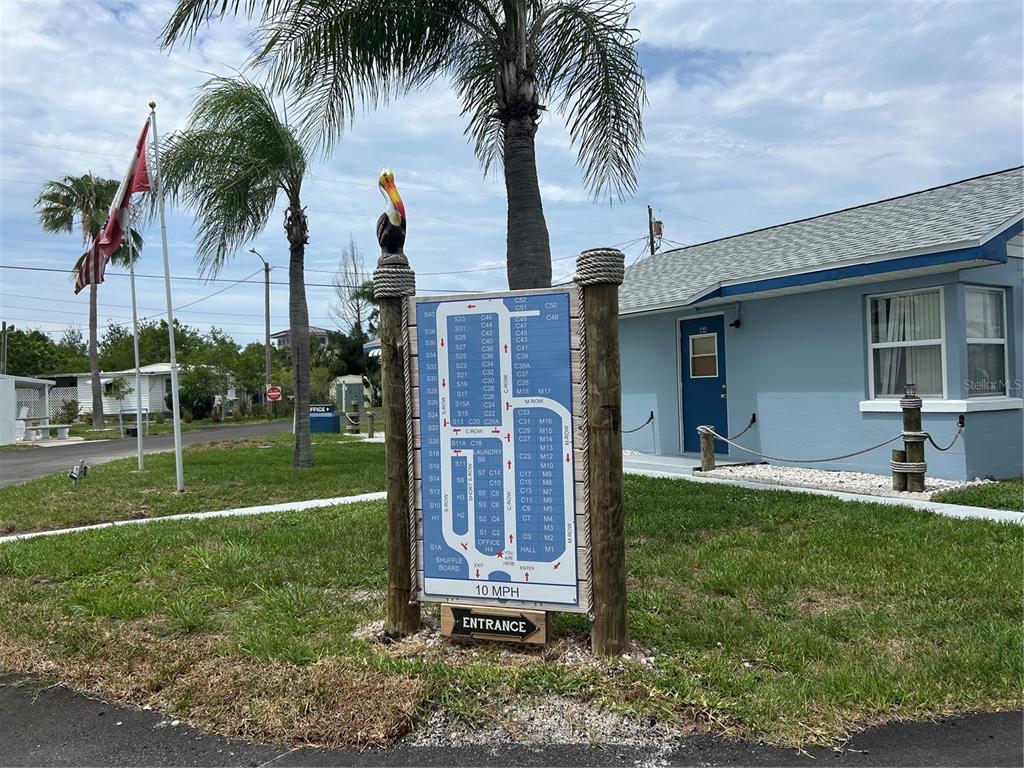 This is a map of a mobile home park displayed on a sign outdoors — 12674 SEMINOLE BOULEVARD UNIT S18, LARGO, FL