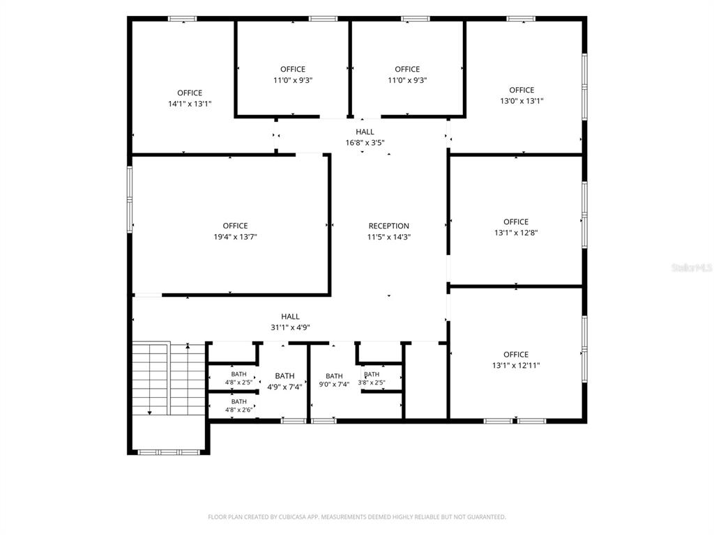 This is a floor plan showing a commercial office layout with multiple rooms and bathrooms — 205 MAGNOLIA STREET, NEW SMYRNA BEACH, FL