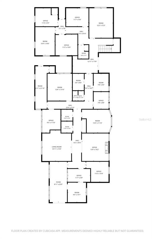 This is a floor plan showing the layout of a multi-room commercial or office building — 205 MAGNOLIA STREET, NEW SMYRNA BEACH, FL