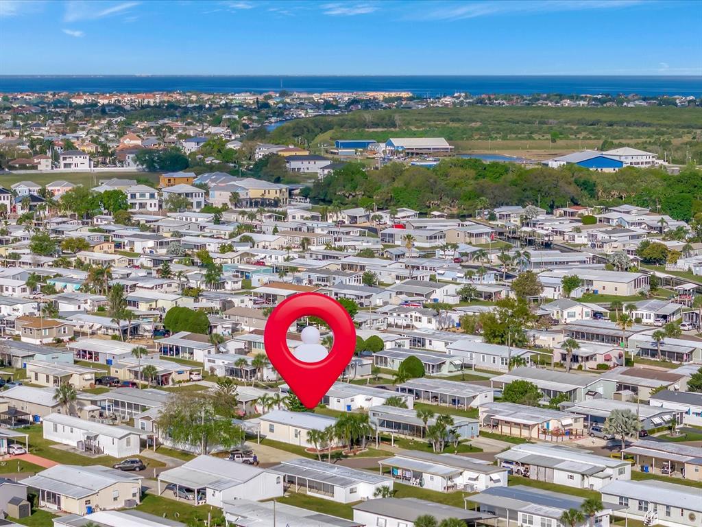 An aerial view shows a mobile home community with a red location pin marking a residence — 118 SAINT PIERRES WAY, APOLLO BEACH, FL