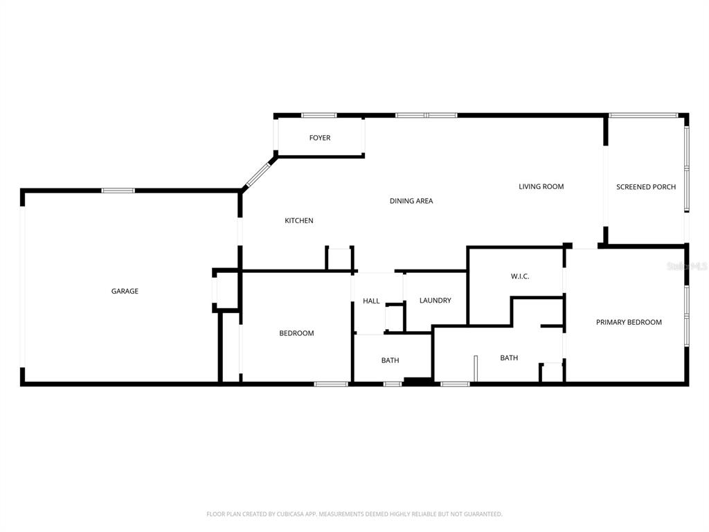 This is a floor plan of a single-story home featuring a garage, two bedrooms, and a porch — 9698 SW 103RD TERRACE, OCALA, FL