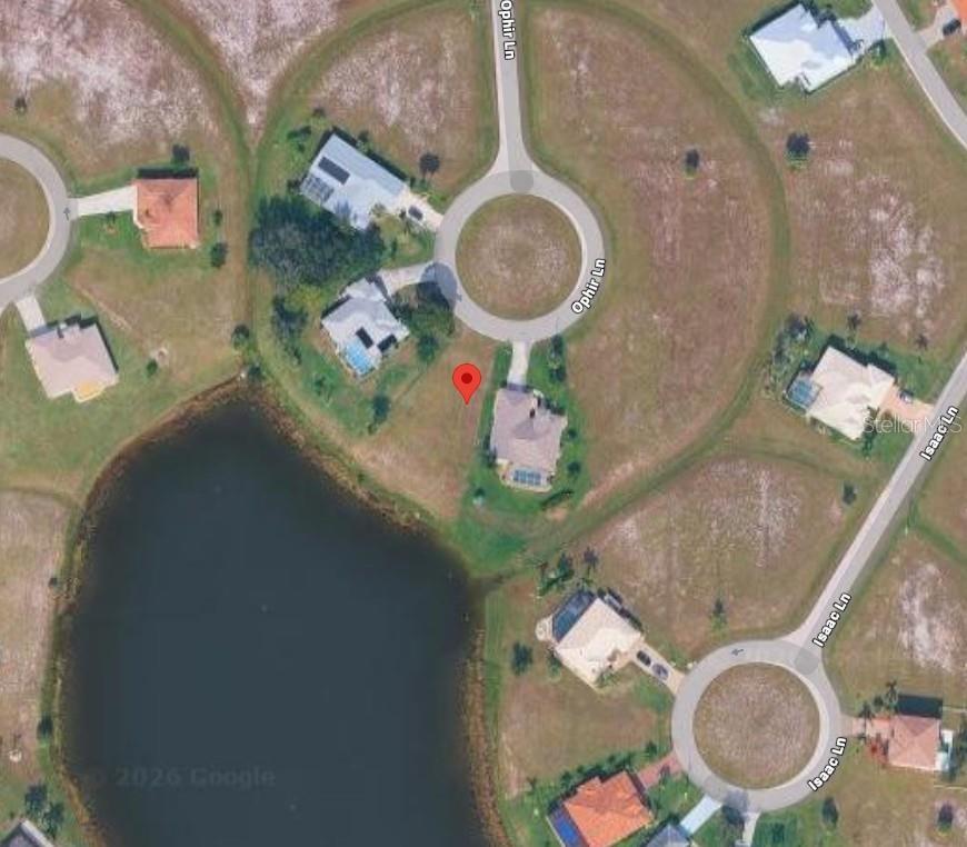 This is a satellite map view of a residential property located on a cul-de-sac — 17369 OPHIR LANE, PUNTA GORDA, FL