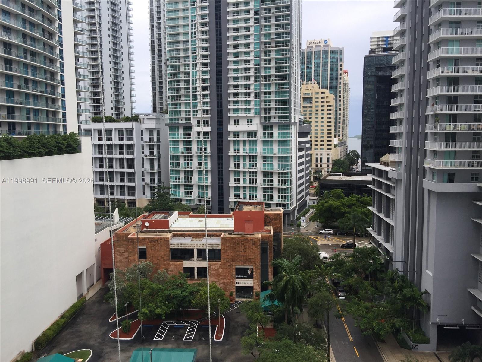 An elevated view of a city street surrounded by tall residential and commercial buildings — 79 SW 12th St, Miami FL 33130, MIAMI, FL
