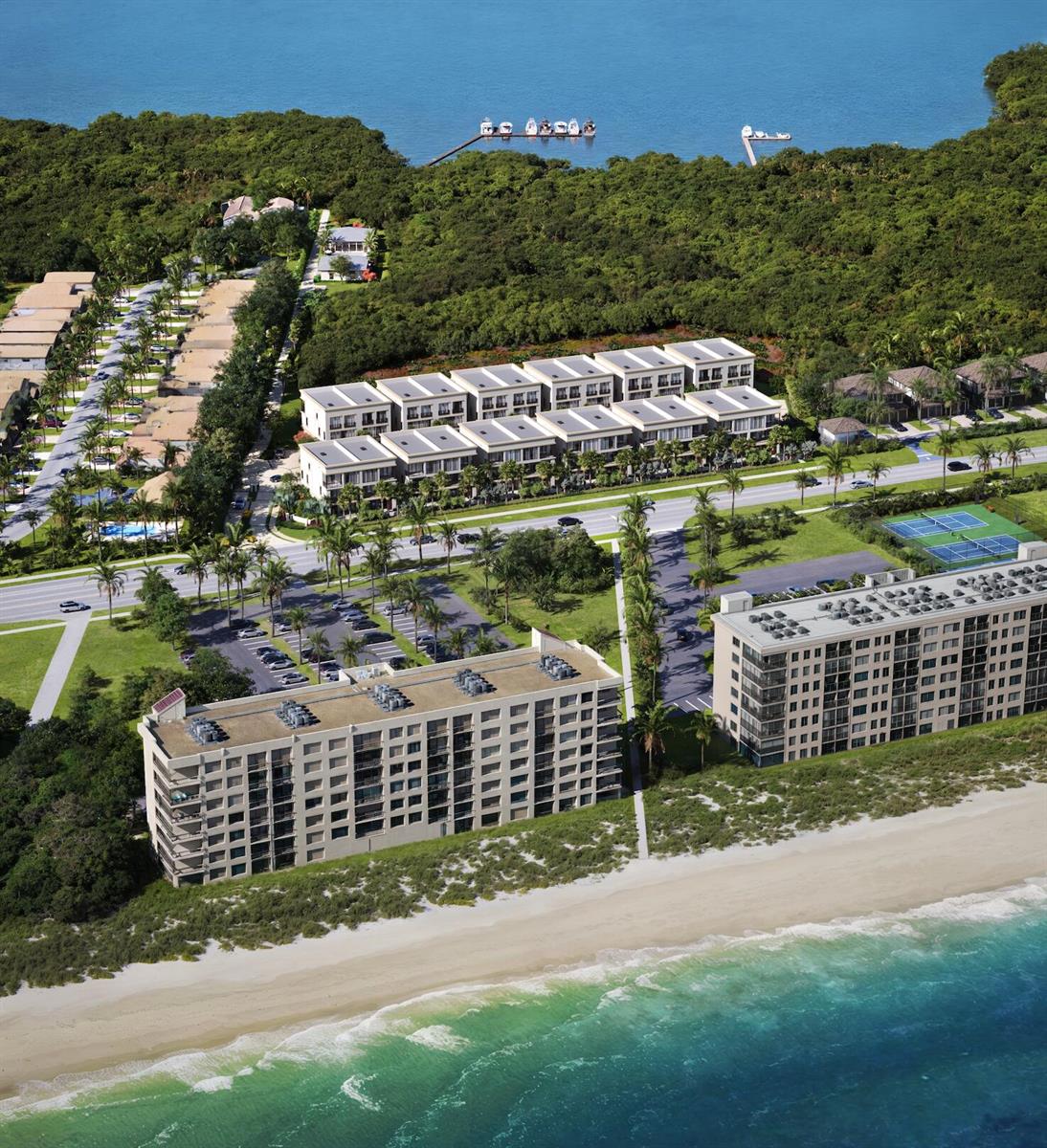 An aerial view shows beachfront condominiums, a parking lot, tennis courts, and a wooded area — 10251 S Ocean Drive # G2, Jensen Beach FL 34957, JENSEN BEACH, FL