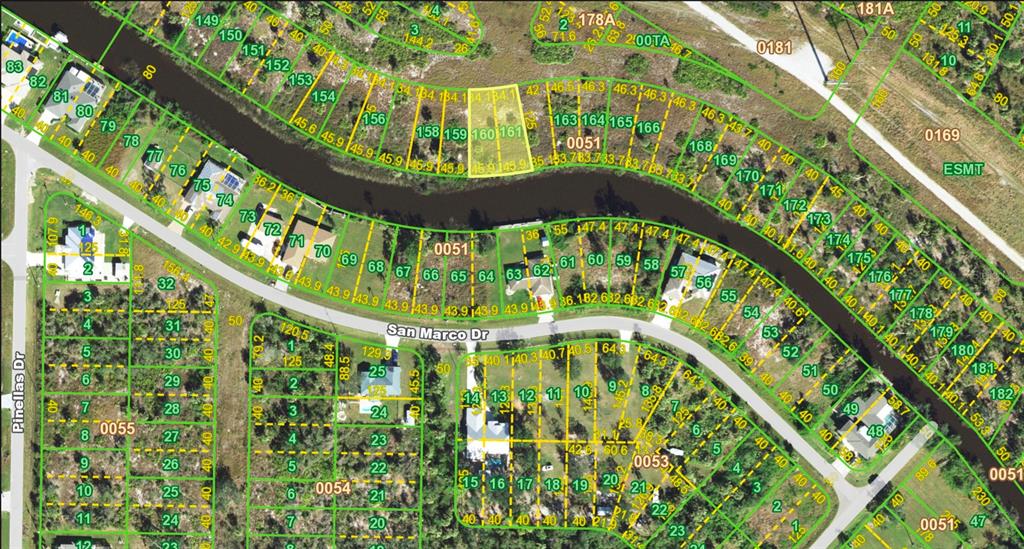 This is a property tax map showing residential lots along a canal and San Marco Drive — 27399 SOLOMON DRIVE, PUNTA GORDA, FL