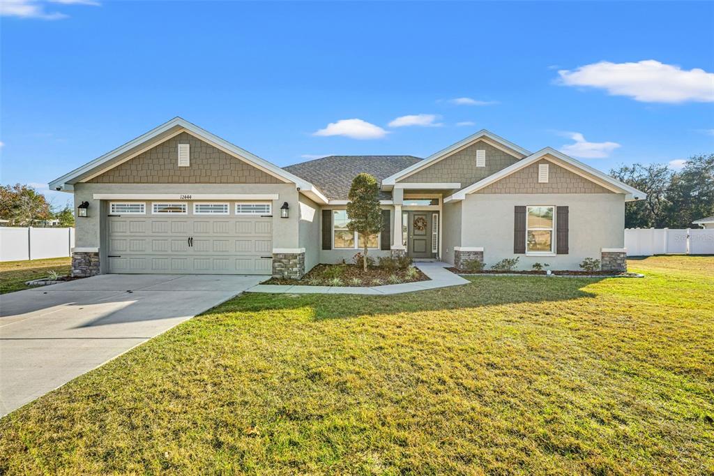 12444 SUNSET WOODS DRIVE