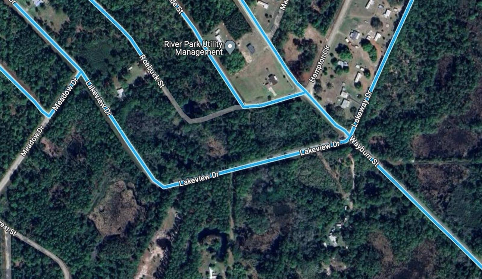 This is a satellite map view showing residential streets and wooded areas in a neighborhood — 00 Glenside Street, FL 32139, FL