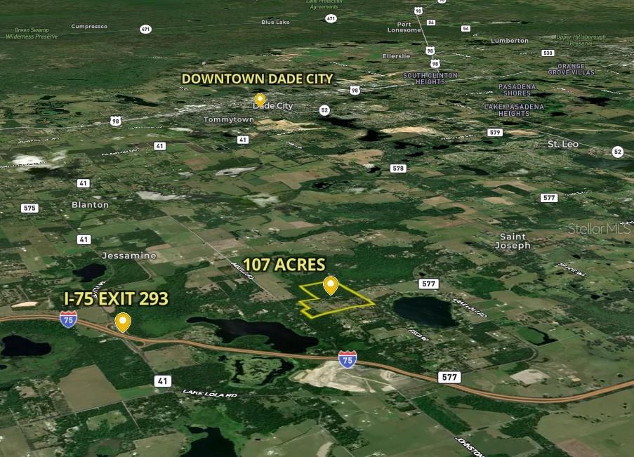 This aerial map shows a 107-acre property located near I-75 Exit 293 in Florida — 31501 REED ROAD, DADE CITY, FL