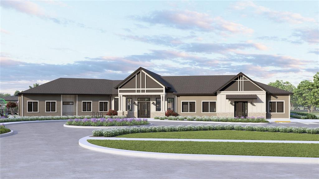 This is a rendering of a single-story commercial building with a tan and white exterior — 883 SHUMARD WAY, LADY LAKE, FL