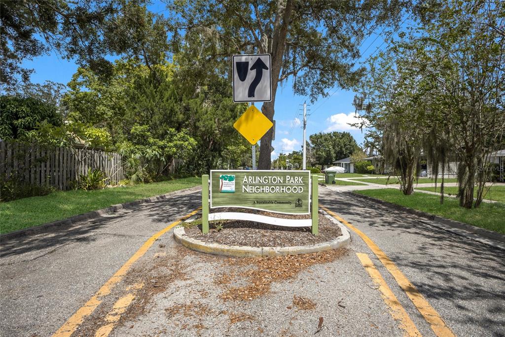A street sign for the Arlington Park Neighborhood stands on a median between two roads — 2070 HYDE PARK STREET, SARASOTA, FL