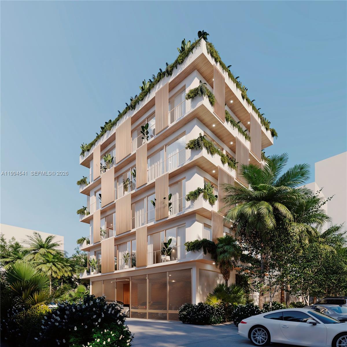 This is a rendering of a modern multi-story building featuring vertical wooden slats and greenery — 829 4th St # 5, Miami Beach FL 33139, MIAMI BEACH, FL