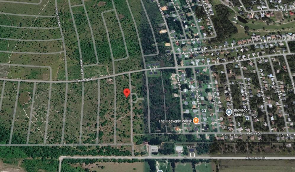 This is an aerial map showing a vacant residential lot marked with a red pin — 4021 PALERMO AVENUE, SEBRING, FL